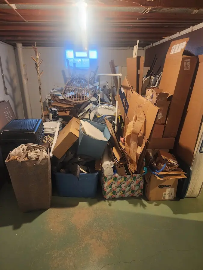 Roll-off dumpster container at job site for Concrete Dumpster Rental in Kingwood